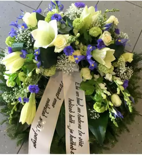 Wreath with blue Irises, white Roses and Lilys