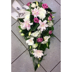 Funeral arrangement: lilys and pink spices