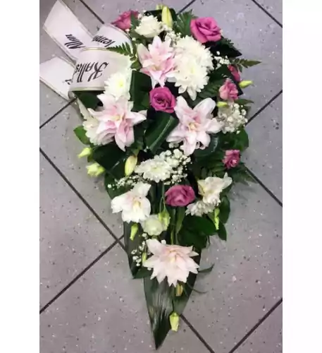 Funeral arrangement: lilys and pink spices