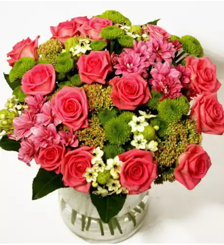 Bouquet of pink roses and green chrysanthemums