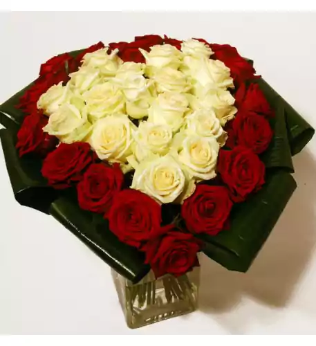 Heart-shaped bouquet of red and white roses Heart-shaped bouquet of red and white roses