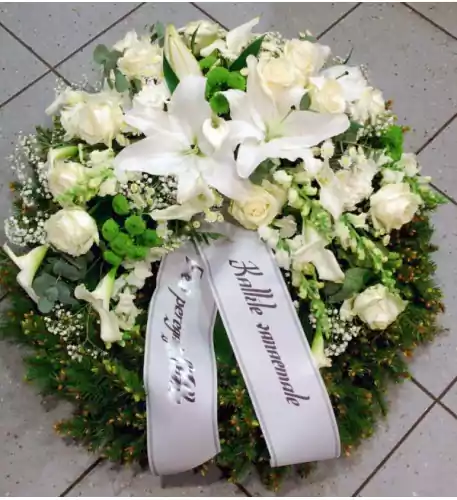 Wreath: white and green Lilys, Roses, Callas, etc.
