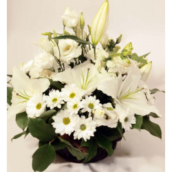 Basket arrangement of white blooms: Lilys, Roses, Chrysantemums