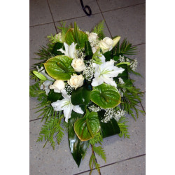Funeral arrangement of white roses, lilys and anthuriums