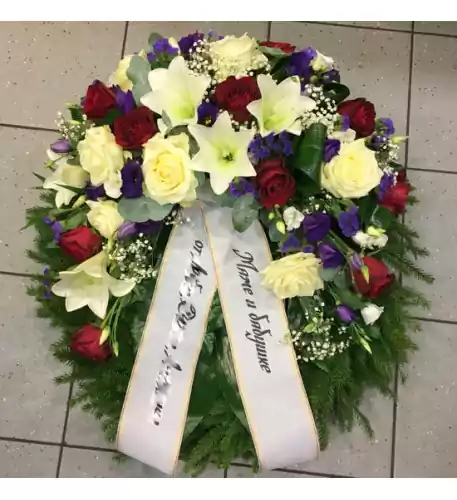 Wreath: White lilacs, white and red roses, lilac irises and lilacs