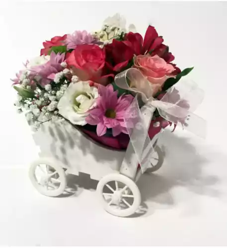 lower arrangement Car with yellow flowers
