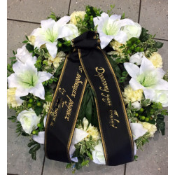 Funeral wreath with artificial flowers