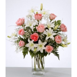 Flower Arrangement In Vase With White Lilies And Pink Roses