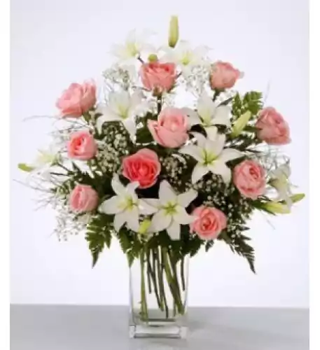 Flower Arrangement In Vase With White Lilies And Pink Roses Flower Arrangement In Vase With White Lilies And Pink Roses